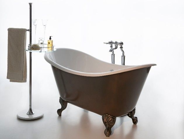 bronze free standing bath with feet next to stand