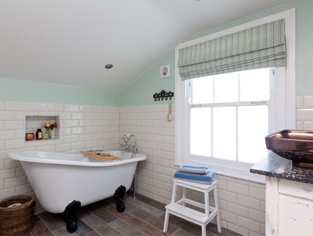 Downsized bathroom with white Metro tiles 1