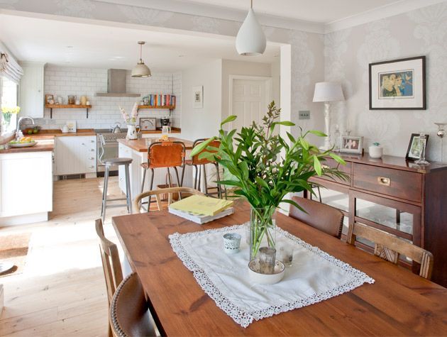 Open plan kitchen diner with island unit and window seat 1