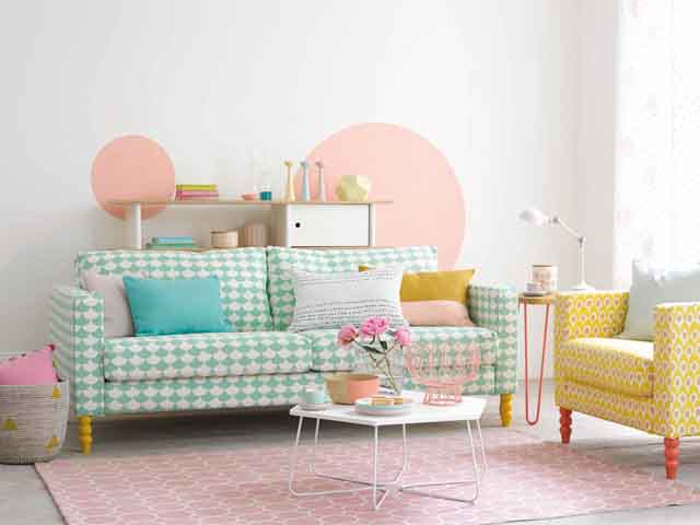 pink, blue and green in pastel colour decor in an open plan living room 
