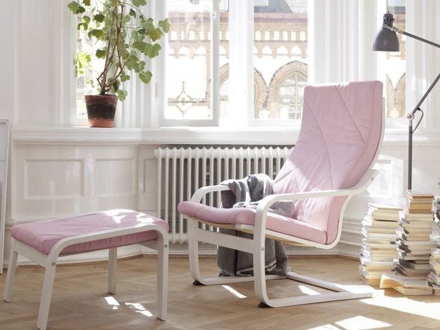 ikea poang chair with matching foot stool in pink and white