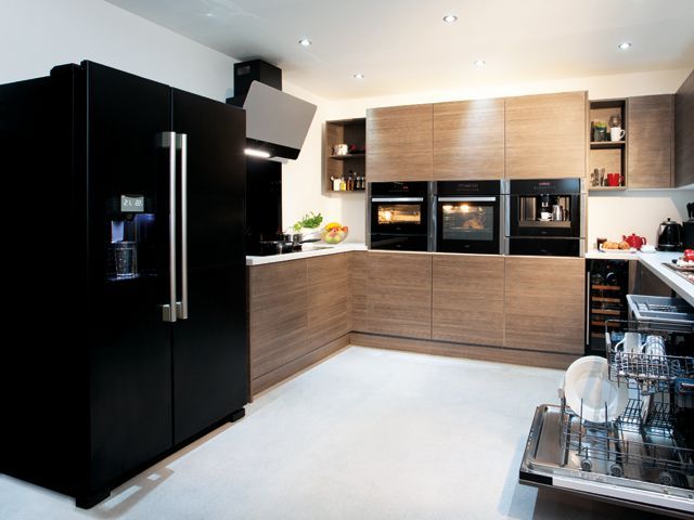 matte black american style fridge freezer by CDA appliances in a real kitchen