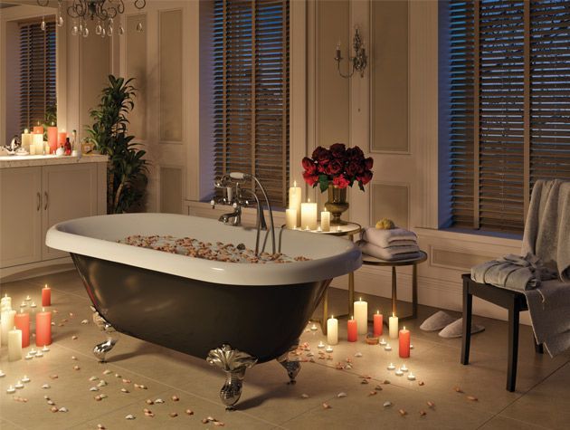 freestanding bath in spa style bathroom with candles