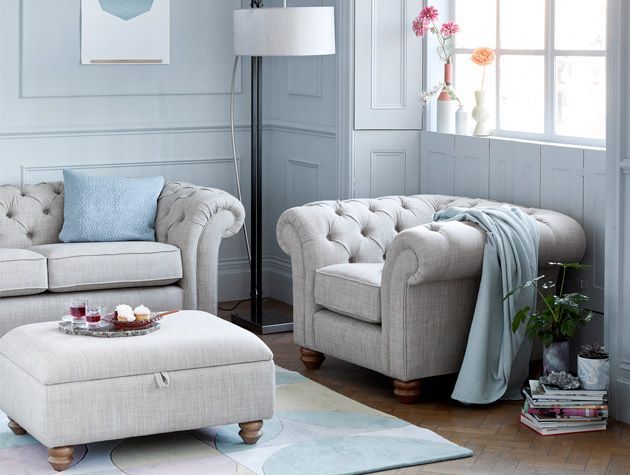 grey storage footstool in blue grey scheme living room