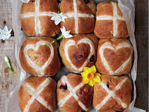 hot cross buns with decorative hearts and kisses crossing batter