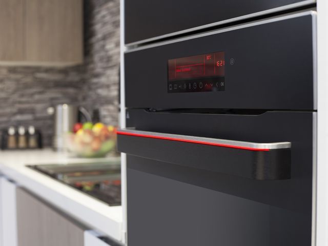 black microwave oven by cda appliances in a real kitchen