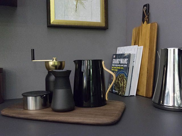 accessories and coffee pot on worktop at good homes roomset at ideal home show 2018