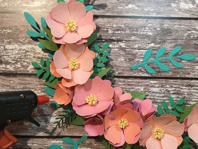 diy spring wreath making materials glue gun pink flowers close up