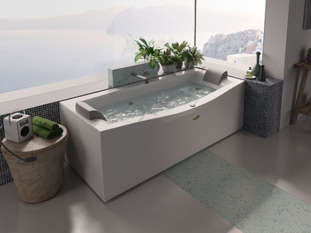 whirlpool jacuzzi spa bath in a bathroom with an ocean view from victoria plum 