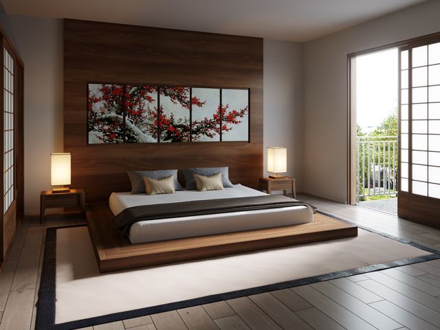 Japanese Zen inspired bedroom with a low wooden bed 