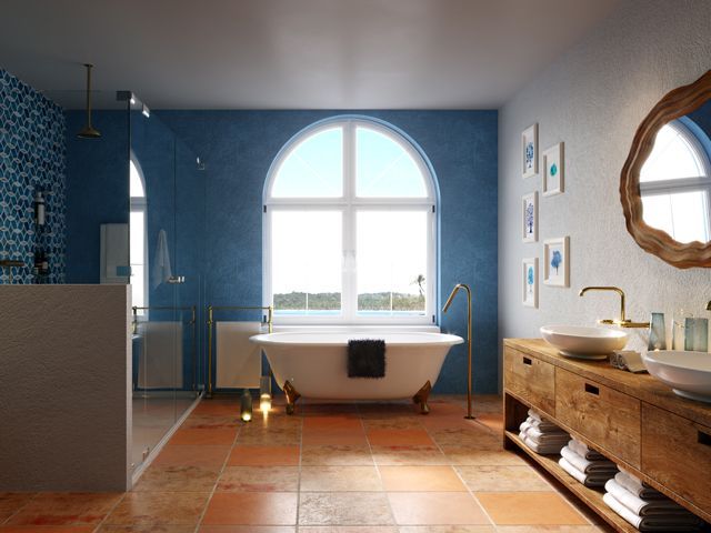 mediterranean bathroom with blue tiles and white washed walls
