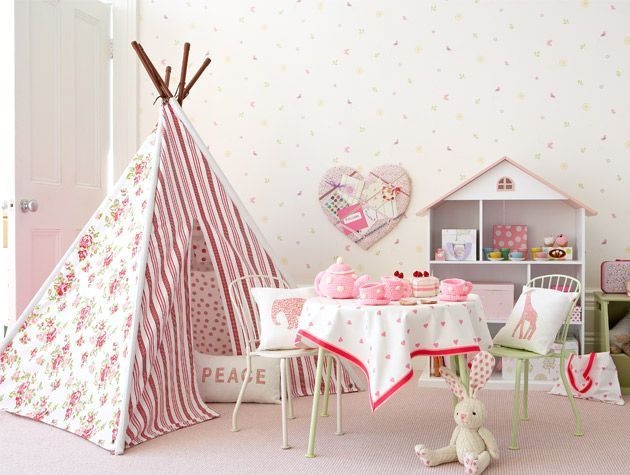 pink and white kids bedroom with tee pee and play tea set