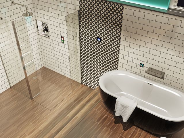 smartap digital smart home system in a bathroom with metro tiles, a black roll top bath and standalone shower