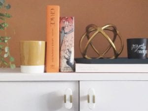 Number five interiors blog's Revamp Restyle Reveal living room with bookcase and cupboard with books and home accessories