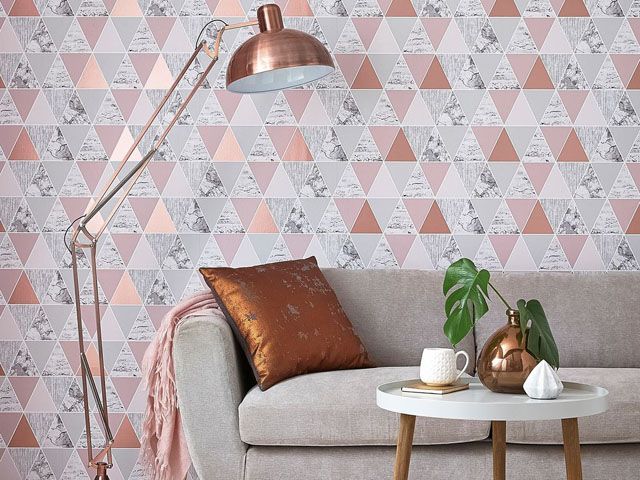 graham and brown triangle pattern rose gold quartz geometric copper wallpaper in a living room