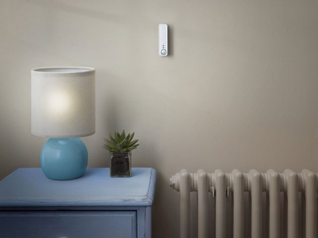 hive motion sensor on wall in a home living room