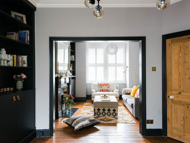 open plan living room with large bay windows