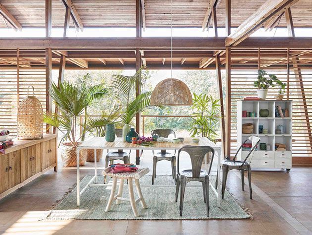 tropical inspired dining room with wicker furnishings copy