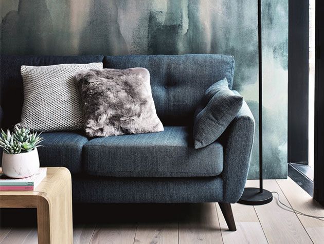 Agros Home autumn winter 2018 collection urban escape blue sofa with blue walls -living-room-goodhomesmagazine.com