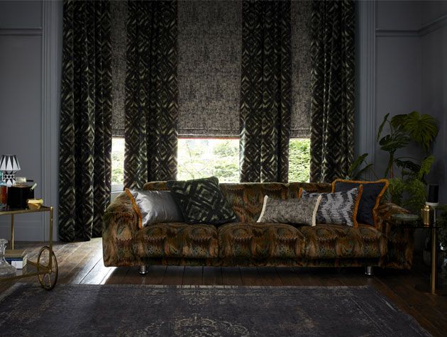 Living room with brown sofa and dark patterned curtains from Abigail Ahern Hillarys collection -livingroom-goodhomesmagazine.com