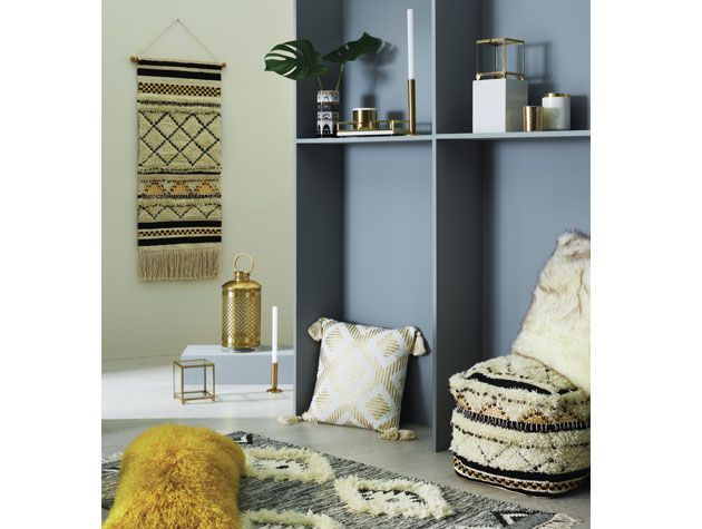 River Island Homeware collection 2018 Aztec fluffy rug, Aztec macrame, gold lanterns, gold and white cushion and mustard cushion -river-island-living-room-goodhomesmagazine.com