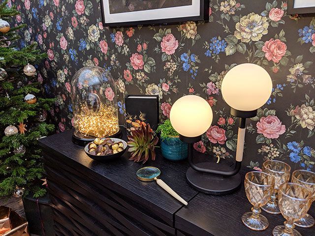 floral wallpaper with black background by Graham and Brown at Good Homes roomsets at Ideal Home Show Christmas 2018 - roomsets - goodhomesmagazine.com