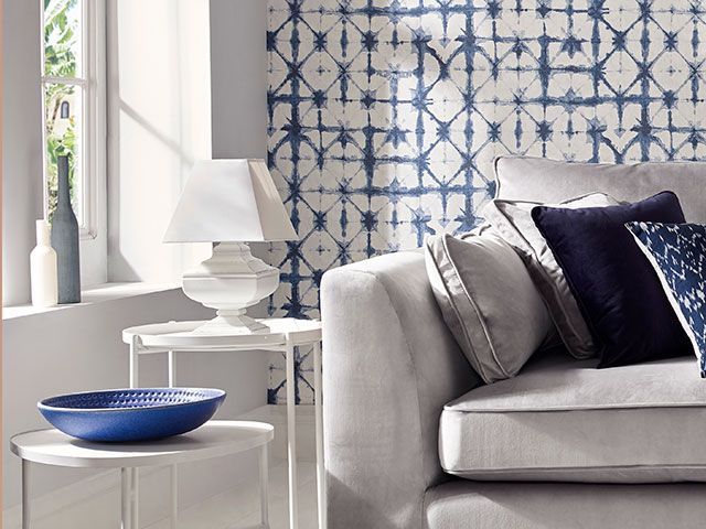 indigo blue print wallpaper by Graham & Brown in a light, airy living room - wallpaper trends 2019 - goodhomesmagazine.com