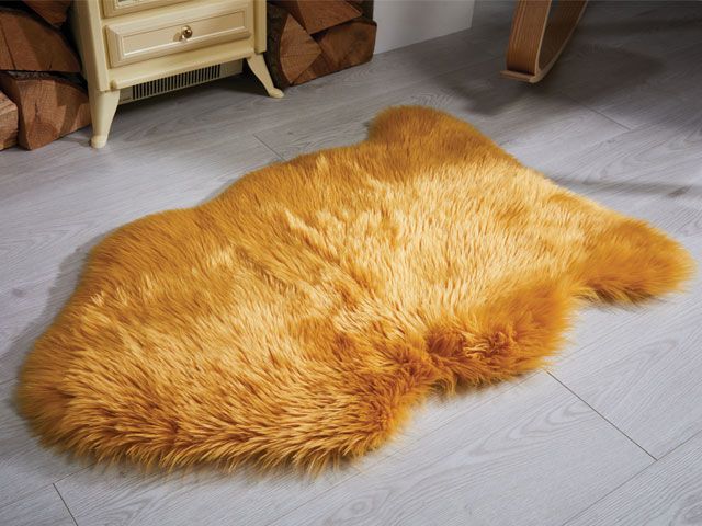 Mustard coloured sheepskin rug -the-rug-seller-living-room-goodhomesmagazine.com