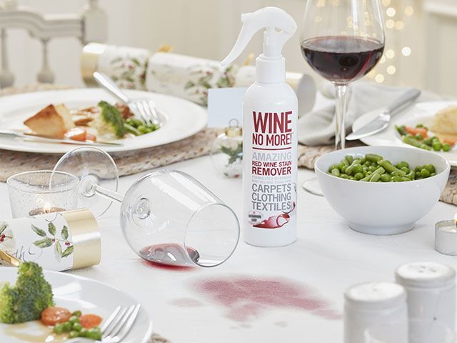 Red wine spill on white Christmas dinner table cloth -lakeland-living-room-goodhomesmagazine.com