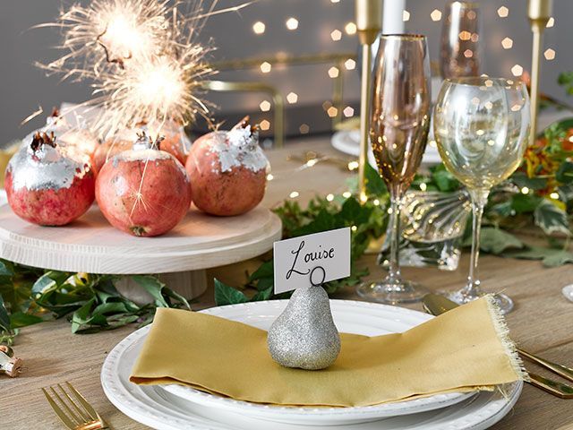 festive scandi-inspired table setting with foliage 