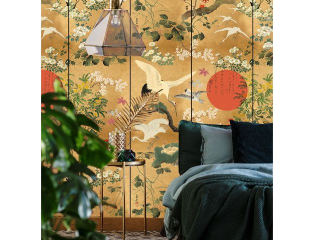 Yellow, Oriental style bird print statement wallpaper used in a bedroom mind-the-gap-living-room-goodhomesmagazine.com