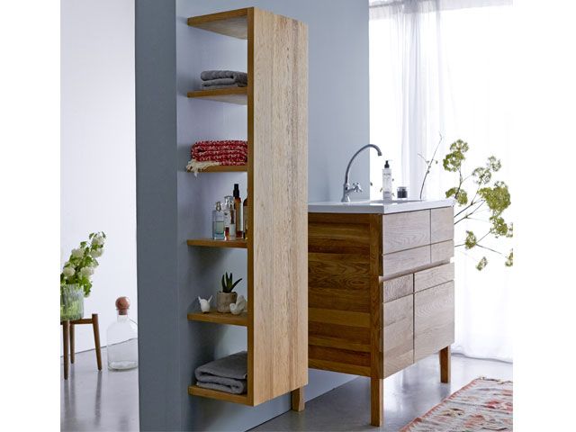 Wooden column unit used in a bathroom tikamoon-living-room-goodhomesmagazine.com