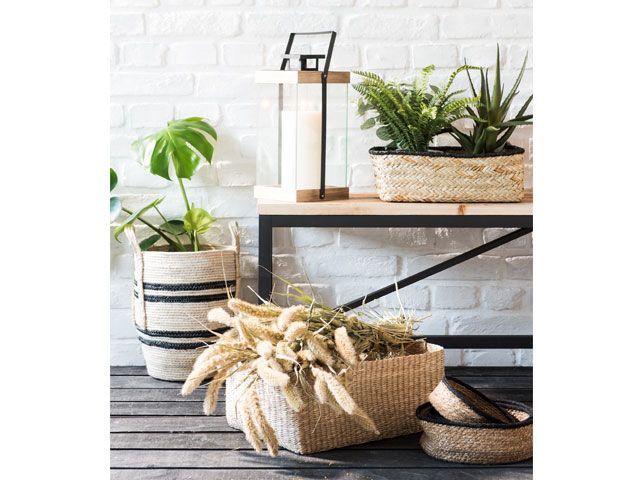 Woven storage baskets filled with plants maisons-du -monde-living-room-goodhomesmagazine.com