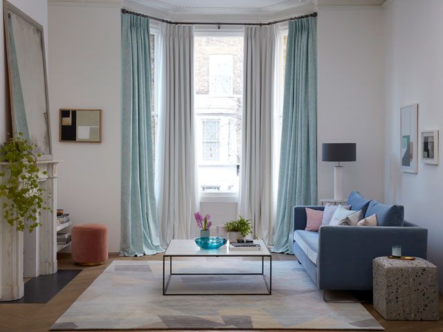 full length curtains in Tetbury white and Emelie duckegg blue by hillarys in a period living room