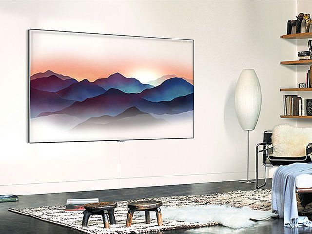 Samsung smart TV with wall hanging -samsung-living-room-goodhomesmagazine.com
