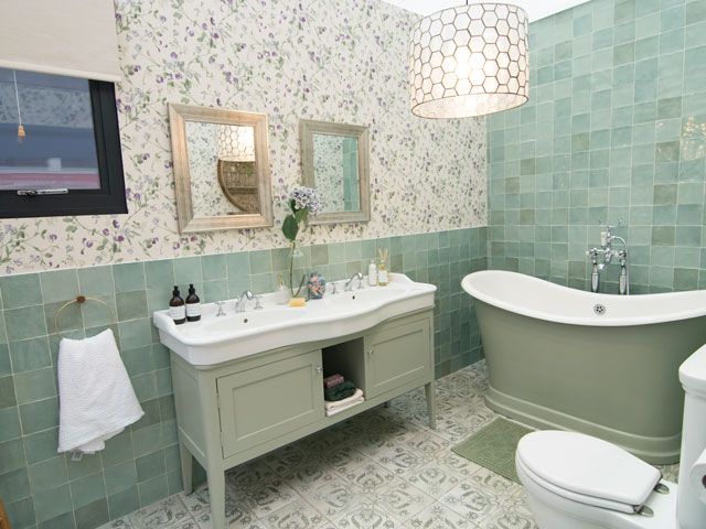 double sinks in the green ensuite bathroom inspired by the Queen in the Good Homes roomsets at Ideal Home Show 2019