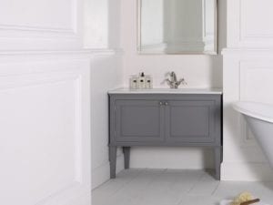 grey hamar vanity console with sink by albion baths in an all-white bathroom
