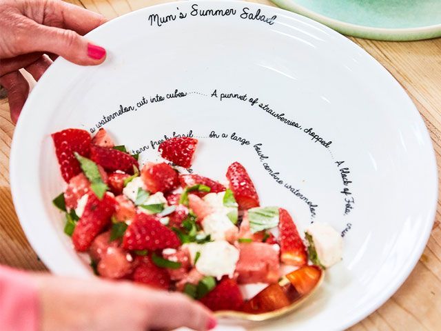 A personalised white ceramic plate filled with strawberries -gemma-wightman-ceramics-notonthehighstreet-shopping-goodhomesmagazine.com