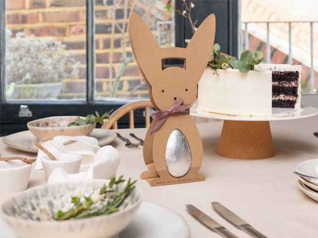 Picture of an Easter table setting with a brown rabbit ornament placed on the table -trouva-living-room-goodhomesmagazine.com