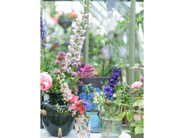 flowers in vases in the Alitex greenhouse styled by Selina Lake at chelsea flower show