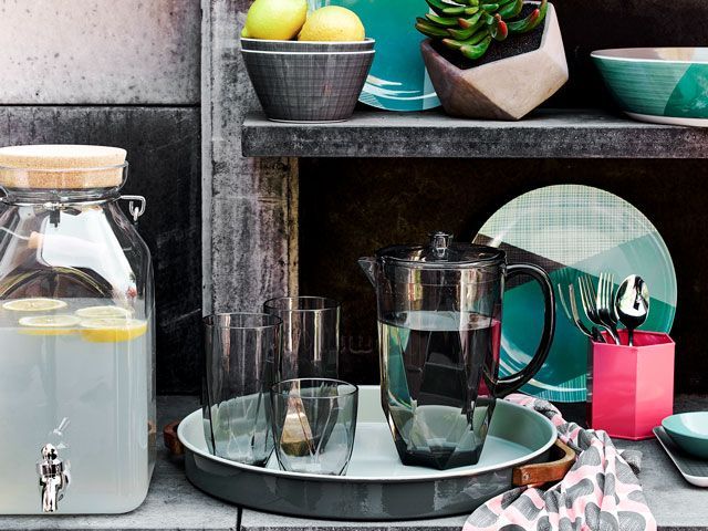 drinks holders, jugs and tap dispensers on outdoor table from Argos SS19 collection