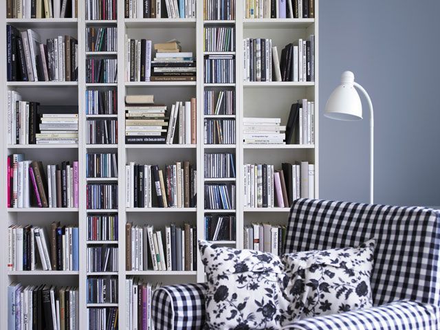 an ikea billy bookcase system in a living room in a real home