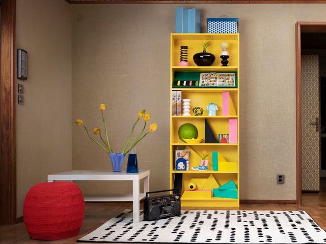 ikea yellow billy bookcase in a living room