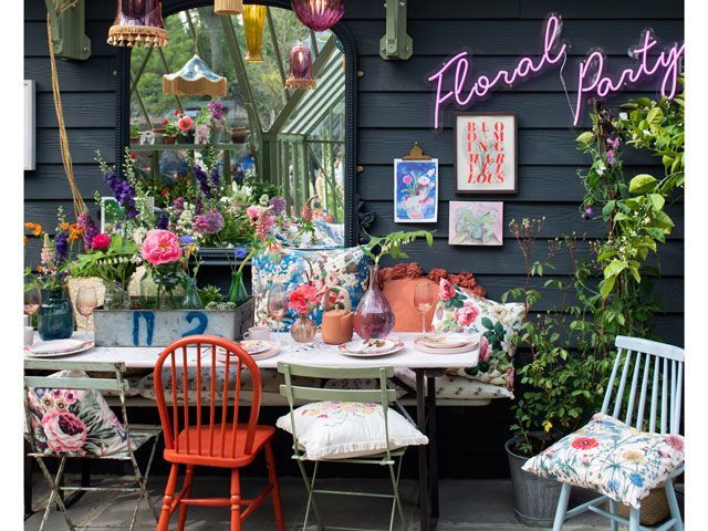 mixed dining table chairs in the Alitex greenhouse styled by Selina Lake at Chelsea Flower Show 2019