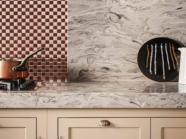 Marble effect composite worktop in kitchen - composite worktops - Corian - goodhomesmagazine.com