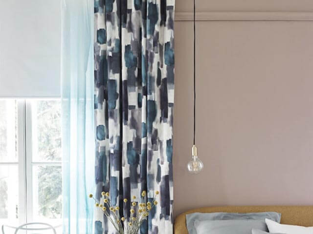 blue patterned curtains matching blue room decor - curtain ideas - John lewis - tropical long curtains with matching blinds and pelmet in rustic living room dining room - curtain ideas - sanderson - goodhomesmagazine.com