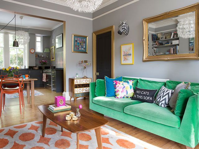 a living room knocked through to the dining room in a real home, a featured in good homes magazine