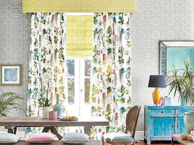 tropical long curtains with matching blinds and pelmet in rustic living room dining room - curtain ideas - sanderson - goodhomesmagazine.com