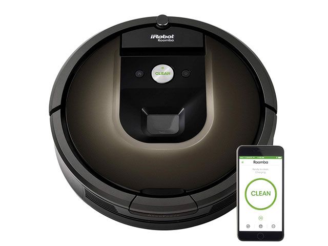 iRobot ROOMBA vacuum cleaner and phone showing app