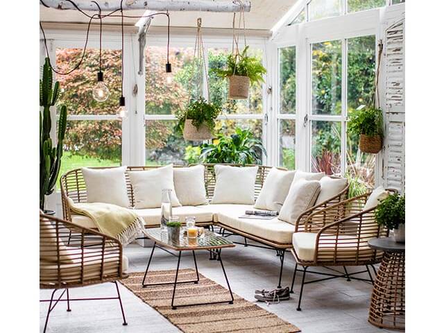 outdoor bamboo furniture in light conservatory - conservatory decor ideas - garden trading - goodhomesmagazine.com